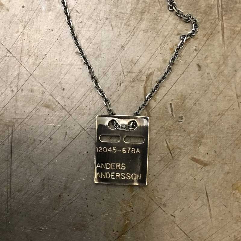 Engraving on dog tag, handcrafted by GULDVIVA